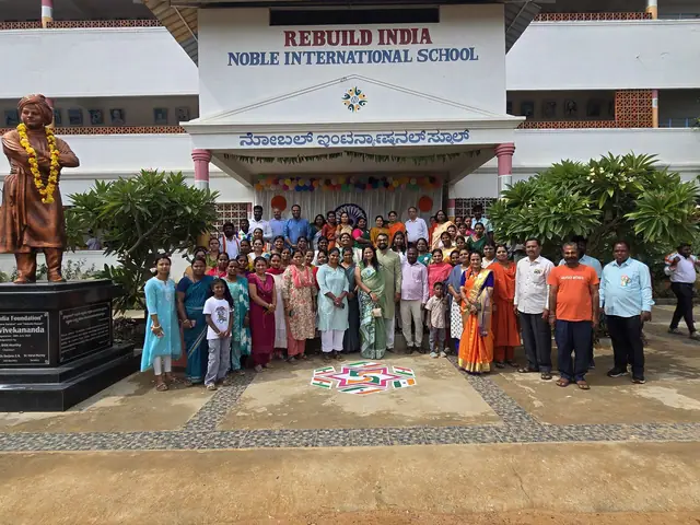 The gathering from further back with the statue and the long school block in frame